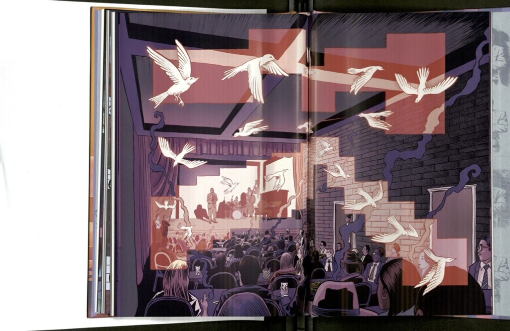 A bird inside a series of pink boxes flies over an audience that watches a band on stage.